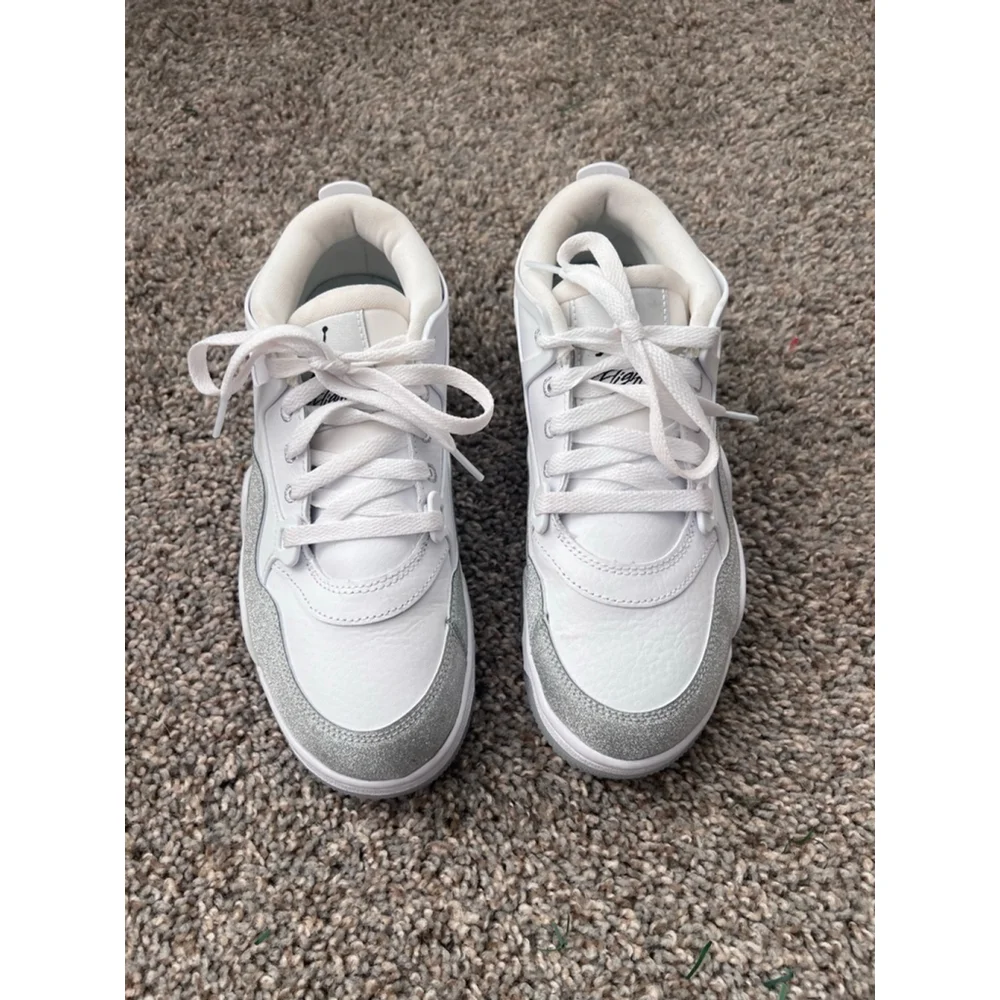 Air Jordan 4 RM 'White Silver Glitter' sneakers with the style code HQ34 size 7